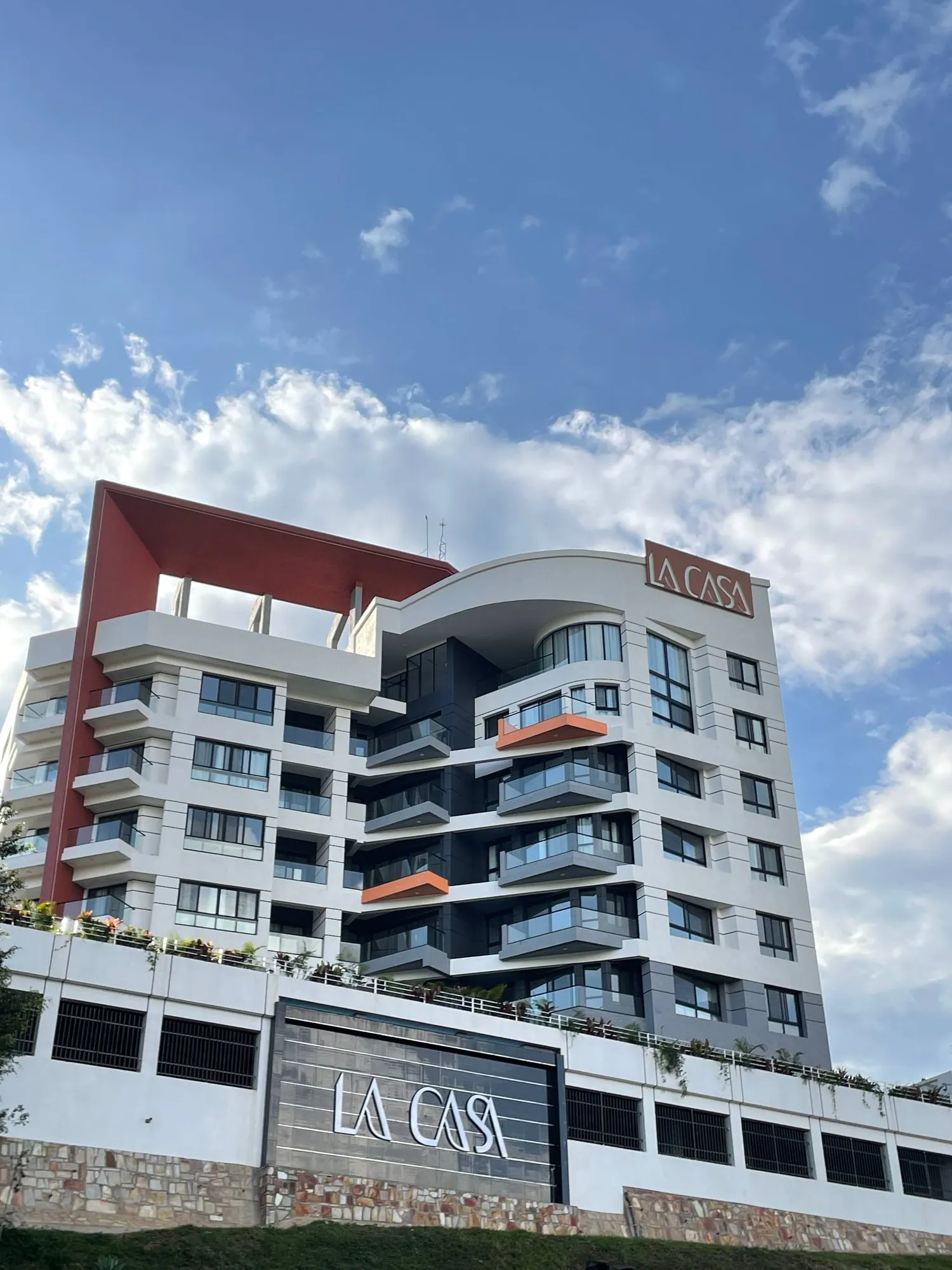 LA CASA building facade under a blue sky